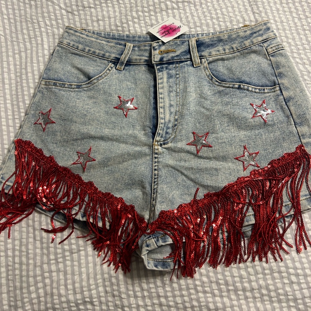 Mainstrip denim shorts with red fringe!